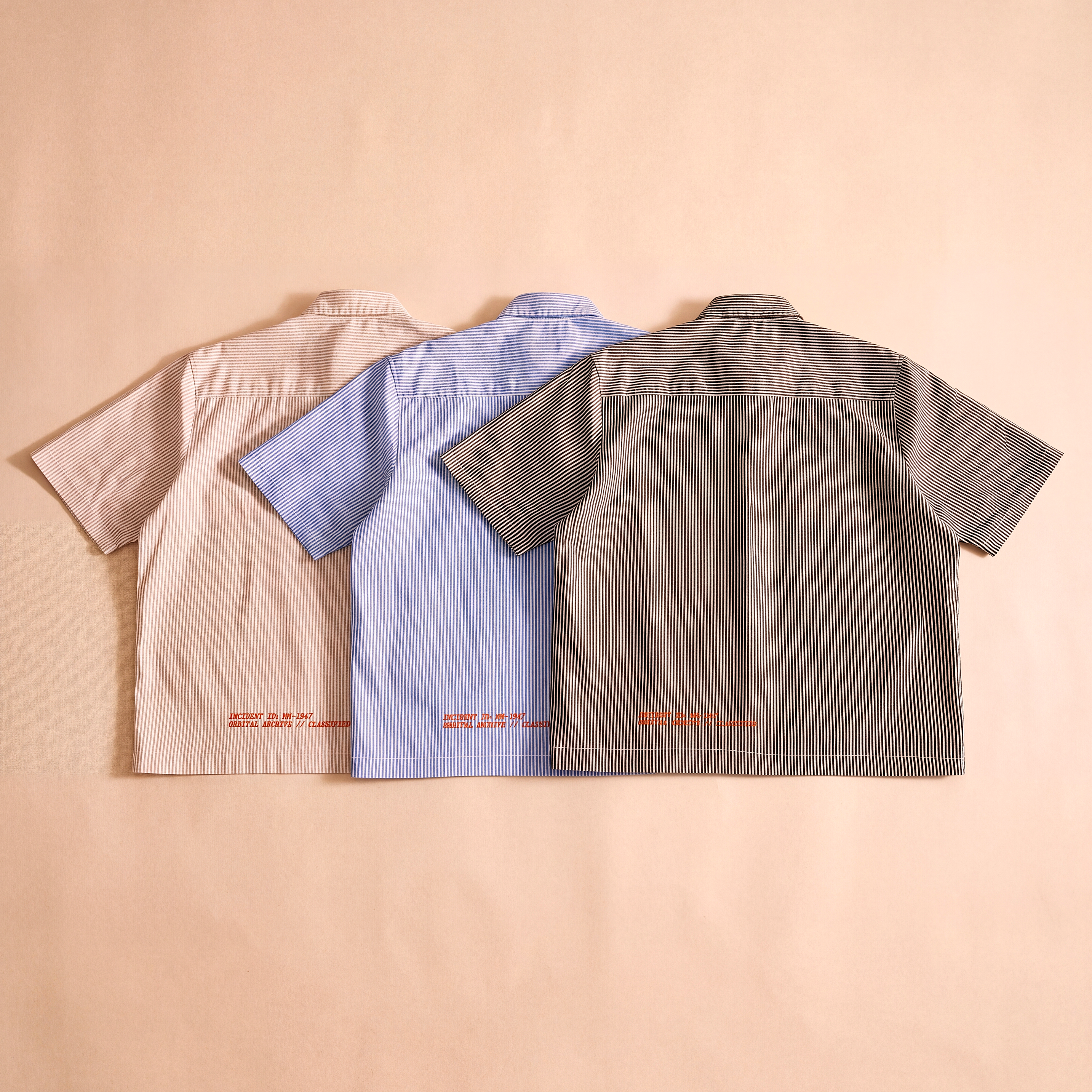 Roswell NM UFO Crash Log Oversized Striped Shirt — Orbital Archive Sci-Fi Streetwear — Boxy Cropped Button Up Short Sleeve Summer Top