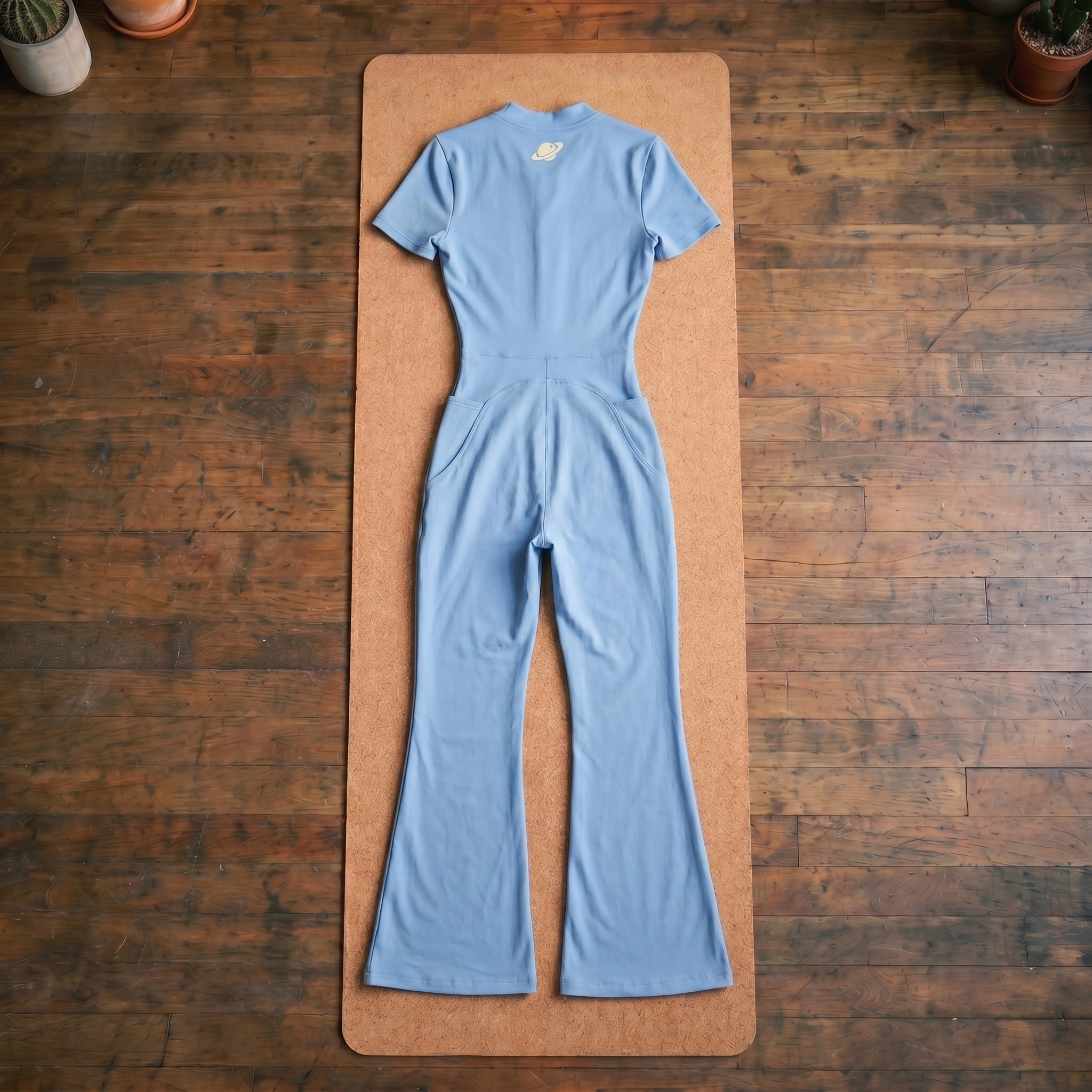 Orbital Archive Women's Tight Flared Leg Quarter-Zip Jumpsuit
