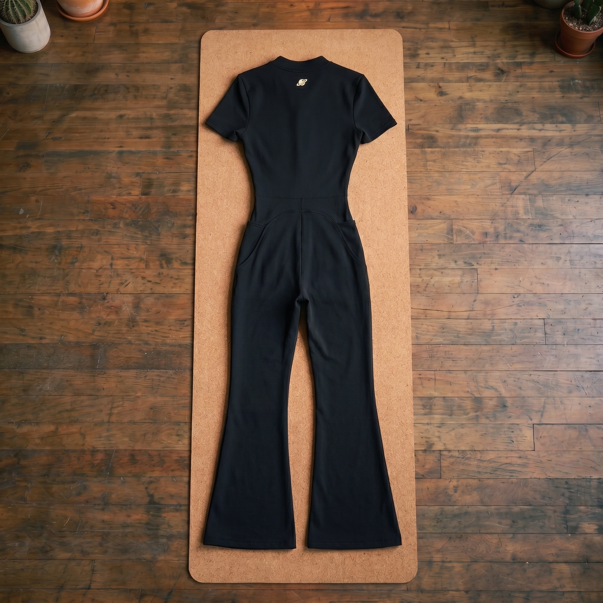 Orbital Archive Women's Tight Flared Leg Quarter-Zip Jumpsuit